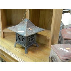CAST IRON HOUSE CANDLE HOLDERS