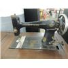 Image 1 : ANTIQUE NEW HOME TREADLE SEWING MACHINE IN CABINET