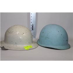 PAIR OF MILITARY STYLE HELMETS