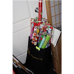 BLACK ROLLING BAG FULL OF WRAPPING