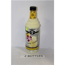 TWO 1L BOTTLES OF MOTTS PINA COLADA MIX