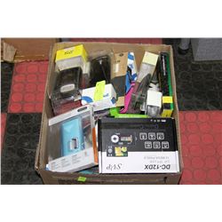 BOX OF NEW PHONE CASES AND DIGITAL CAMERA