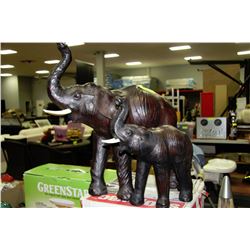 PAIR OF LEATHER ELEPHANT ORNAMENTS
