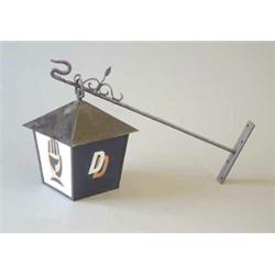 A plastic Double Diamond advertising lamp, with wrought iron bracket....