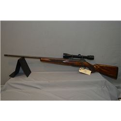 Sauer ( W.Germany ) Model 200 .7 MM Rem Mag cal Mag Fed Bolt Action Rifle w/ 26" bbl w/ screw on muz