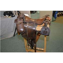 Antique Military Leather Saddle ( Marked B.H.A. behind seat ), also stamped 86CFA , Rifle scabbard (