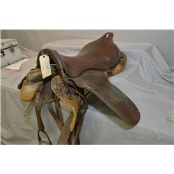 Antique Military Saddle ( stamped CLH ) possible Calgary Light Horse ?, c/w wooden stand