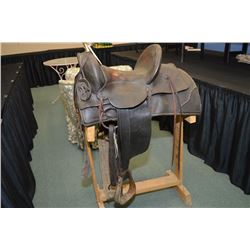 Antique Western Hi Back Saddle w/ brass horn, ( J.E.S. stamped on right side ) , floral decoration ,