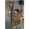 Image 1 : Universal 1902 Pattern Antique Saddle, numrahs good, c/w 2 bridles & wooden stand