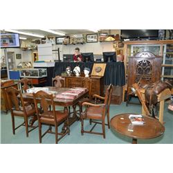 Eight piece walnut dining room suite including table w/ jackknife leaf, six chairs including one car