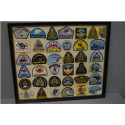 Wood Framed Display - Approx 36 RCMP Embroidered Badges : Lethbridge S/Division - Inuvik - Criminal 