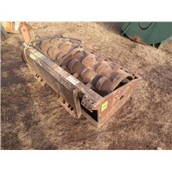Melroe packer for skidloader