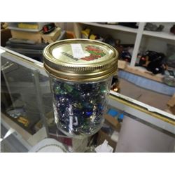 JAR FULL OF ASSORTED MARBLES