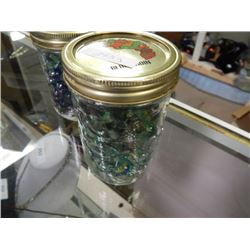JAR FULL OF ASSORTED MARBLES