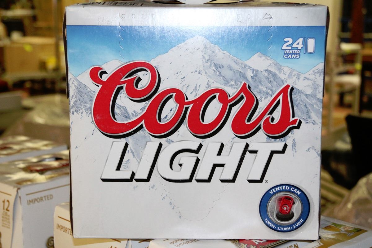 CASE OF 24 CANS OF COORS LIGHT BEER Kastner Auctions