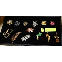 DISPLAY OF VINTAGE FASHION BROOCHES