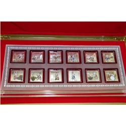 12 COIN YEAR OF THE RABBIT COIN SET IN WOOD CASE