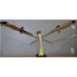 PAIR OF DECORATIVE ANTLER DAGGERS IN STAND