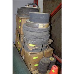 STACK OF NORTON GRIND WHEELS