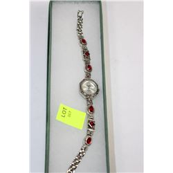 LADIES VANITY FAIR WATCH W/ RED GARNET STONES