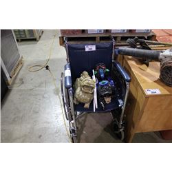 2 STONE STATUES & WHEEL CHAIR