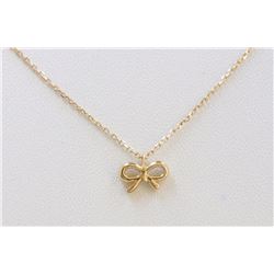 14K YELLOW GOLD BOW PENDANT WITH CHAIN:2g/Diamond:0.03ct