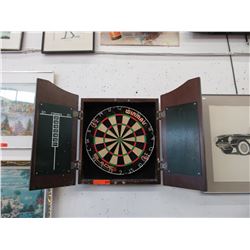 Used dartboard in wall box