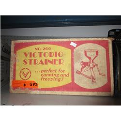 Vintage strainer in original box