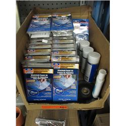 Box of new windshield repair kits