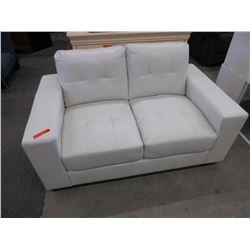 White bonded leather love seat