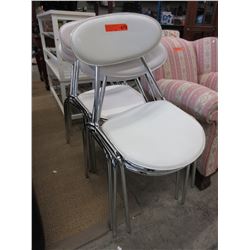 6 Used stacking chairs