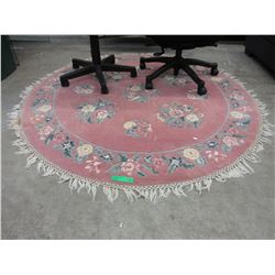 Used wool round accent carpet
