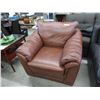 Image 1 : Brown leather arm chair