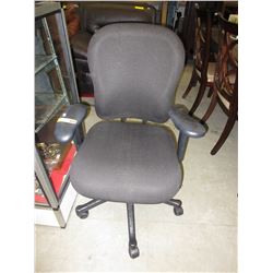 Hydraulic office chair with black upholstery