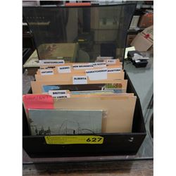 Canadian post card collection in box.