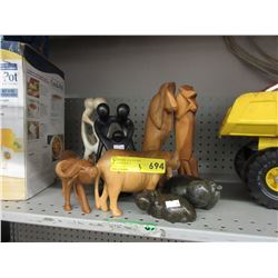 8 Carved statuettes