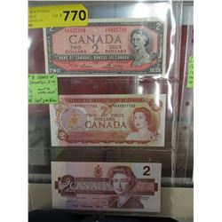 Last 3 issues of the Canadian $2 bill