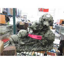 Concrete garden ornament of puppies