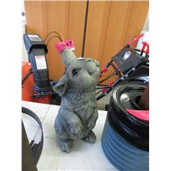Cement rabbit figurine