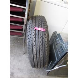 Radial truck tire with rim - used