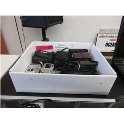 Box of used cameras & cellphones