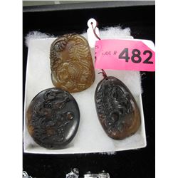 3 New carved stone pendants