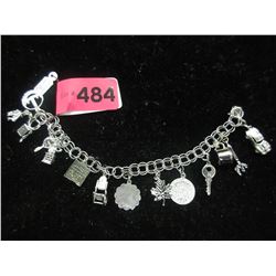Silver charm bracelet stamped "E.J. Sterling"