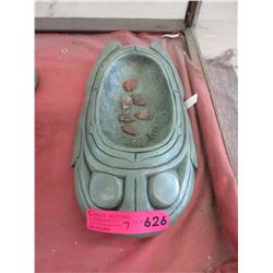 Concrete frog dish with 6 stone arrowheads