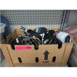Box of used hockey gear