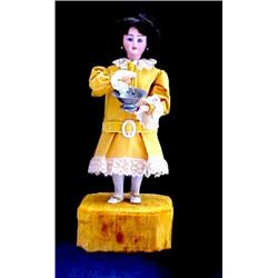 13in. MECHANICAL DOLL