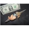 Image 2 : CHILD'S PLAY 2 SCREEN USED KNIFE FROM CHUCKY'S ARM WITH FLESH SHIRT SWATCH AND TAPE STILL ATTATCHED