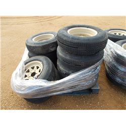 1 LOT (12) ST215/75D14 FOAM FILL TIRES & RIMS, OFF ROAD USE ONLY, 5 ON 4 1/2" BOLT PATTERN