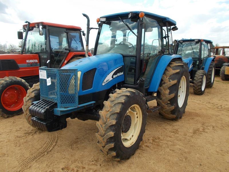 NEW HOLLAND TL100A MFWD FARM TRACTOR, S/N HJS021891, ECAB W/ AIR, 3 PTH