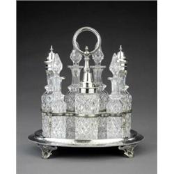 A Victorian seven-bottle oval cruet frame,...